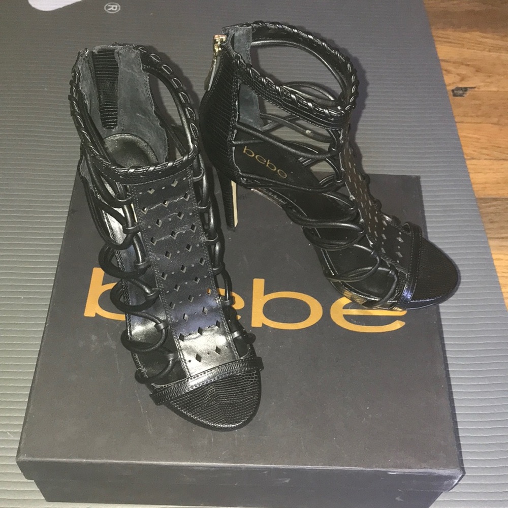 Bebe black high heels size 8 worn a fee times.